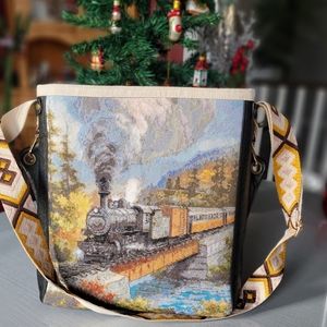 Handmand danier leather and needlepoint purse